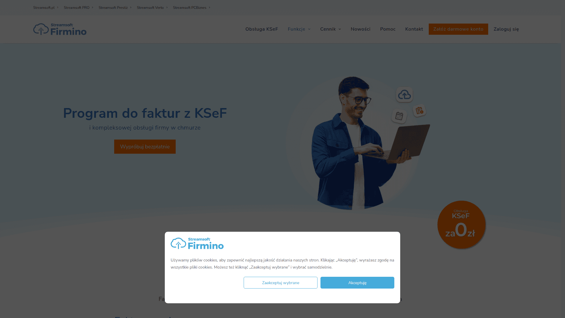 Pracownik korzystający z laptopa w biurze, analiza danych i praca z dokumentami.